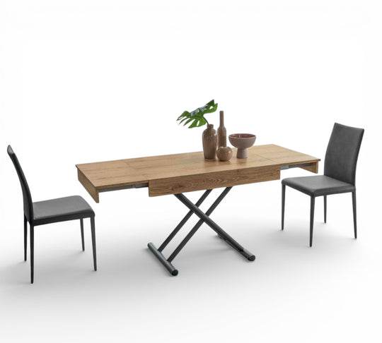 Boxy Small wooden dining table with black chairs on a white background