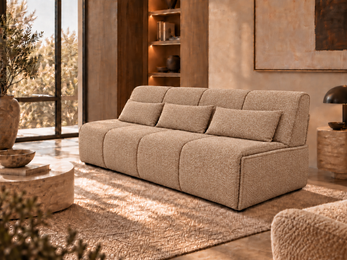 Flip 3 modern three-seat sofa bunk bed upholstered in a textured beige romo fabric, styled in a warm, contemporary living room with wooden accents and a large window.