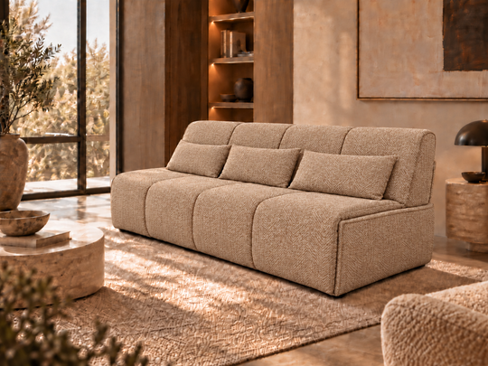 Flip 3 modern three-seat sofa bunk bed upholstered in a textured beige romo fabric, styled in a warm, contemporary living room with wooden accents and a large window.