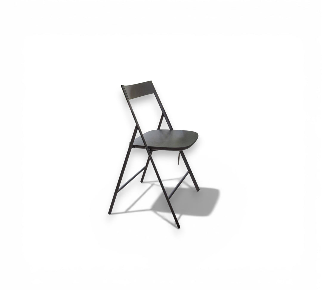Black Joe folding dining chair on a white background London UK