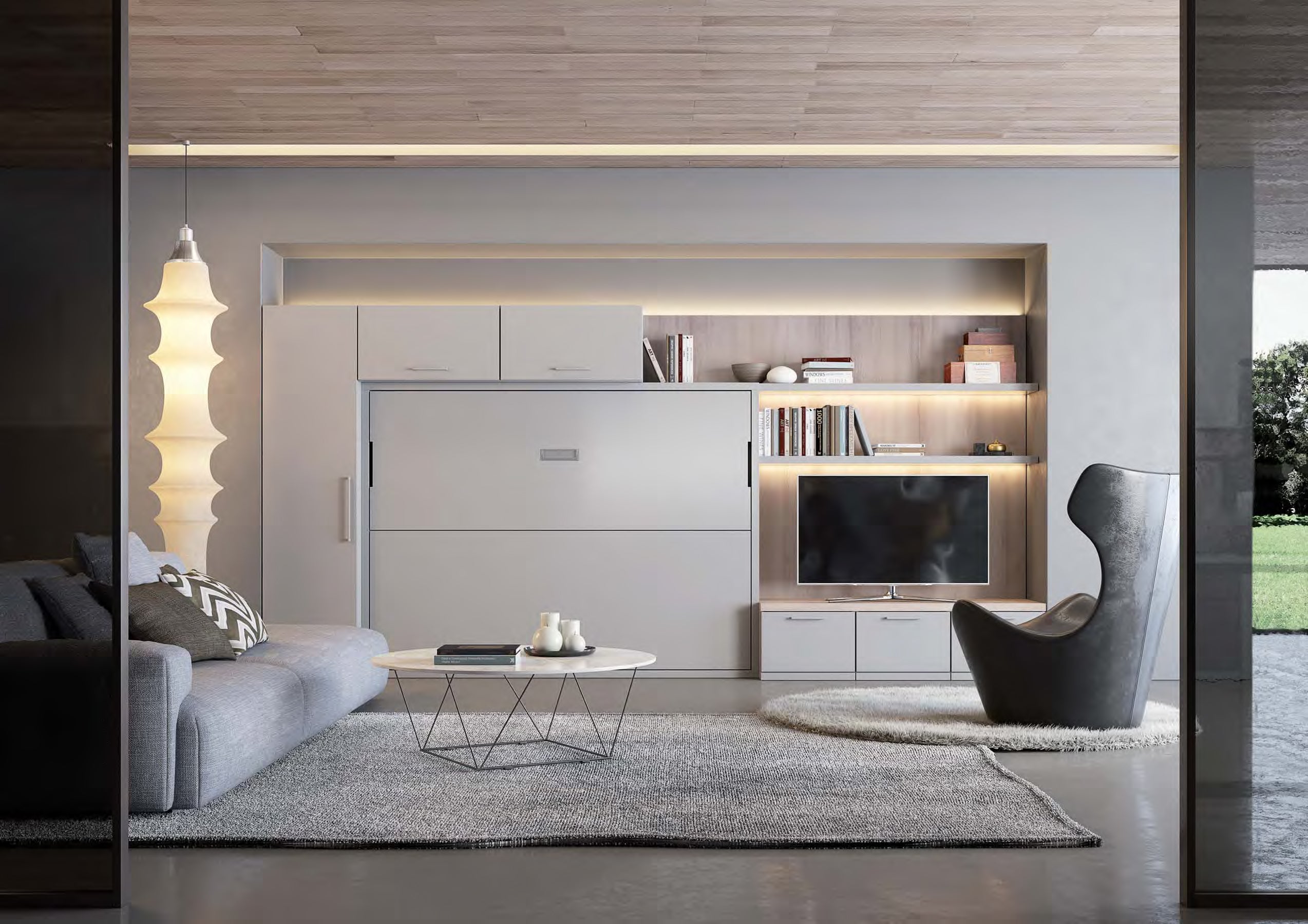 Lateral horizontal wall bed. Modern living room with grey sofa, coffee table, and entertainment unit.
