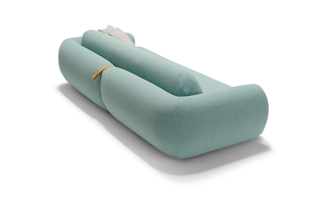 Close up of Light blue Space sofa on a white background