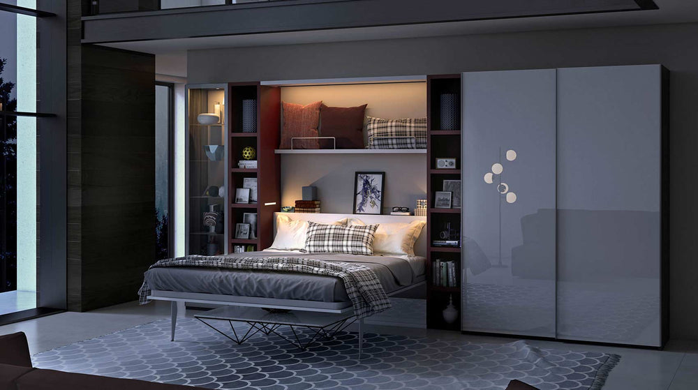 Modern bedroom with a City TV wall bed, shelves, and wardrobe by night
