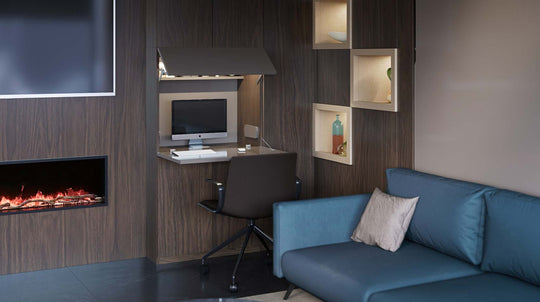 Modern living room with blue City sofa wall bed and Home Office.
