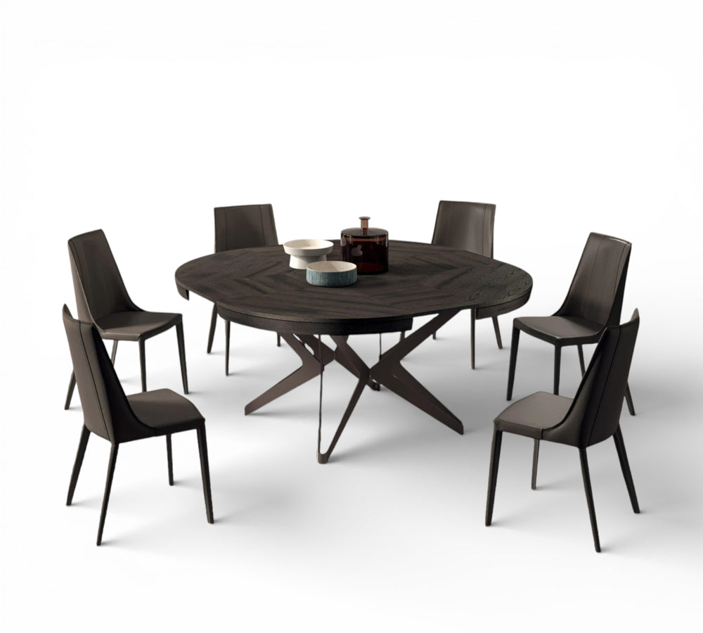 Big Round dining table set with six chairs on a white background