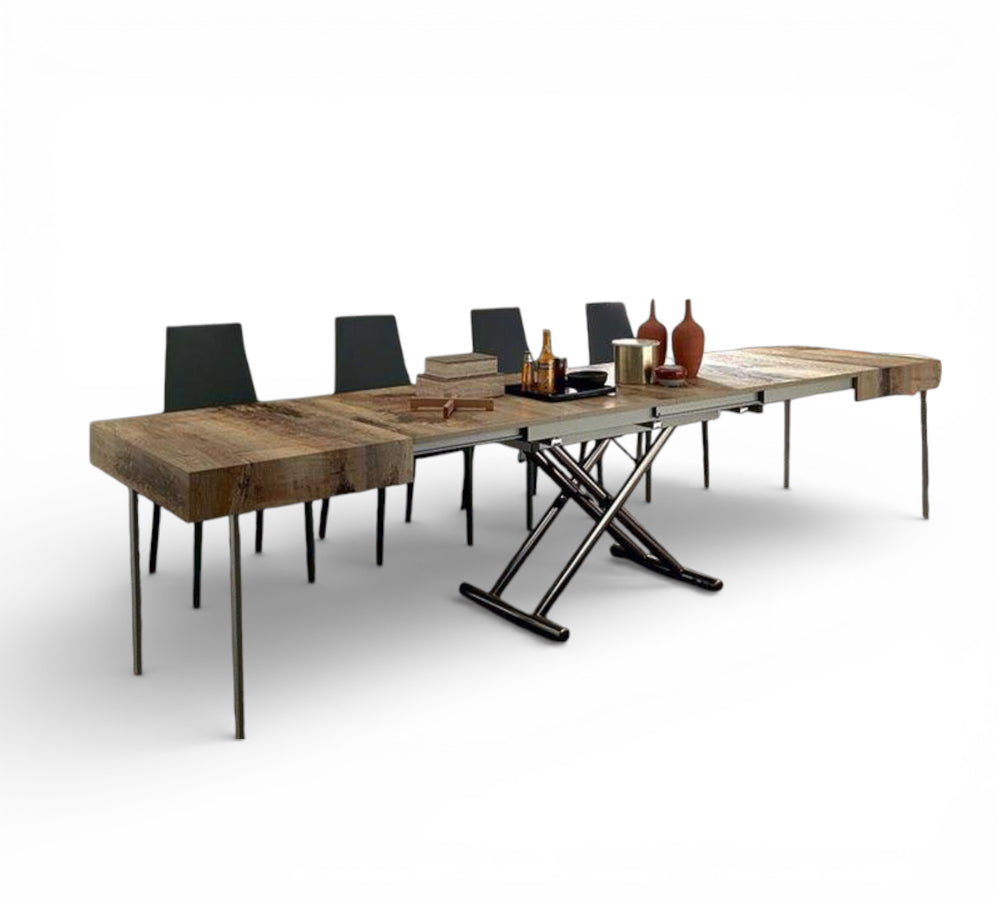 Boxy XL dining table with black chairs on a white background