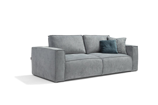 Gray sofa with cushions on a white background