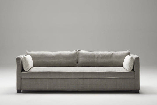Andersen sofa or sofa bed on a grey background